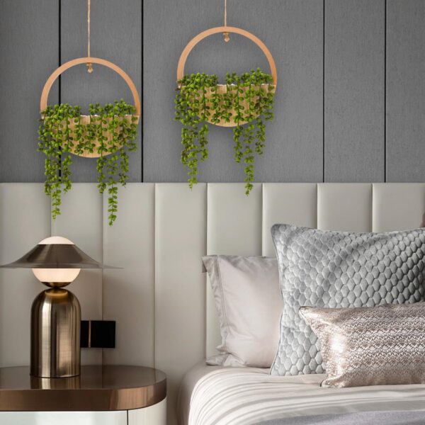 Artificial hanging plants in the bedroom on the wall, wooden color, and in two pieces for decorative use.