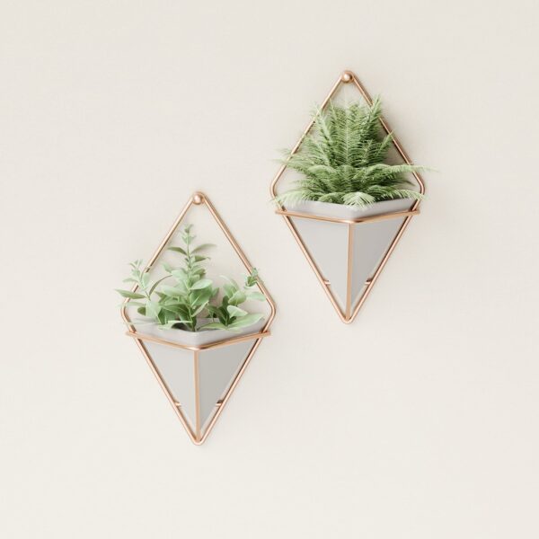 Two Concrete and Copper wall planters with plants in indoor setting
