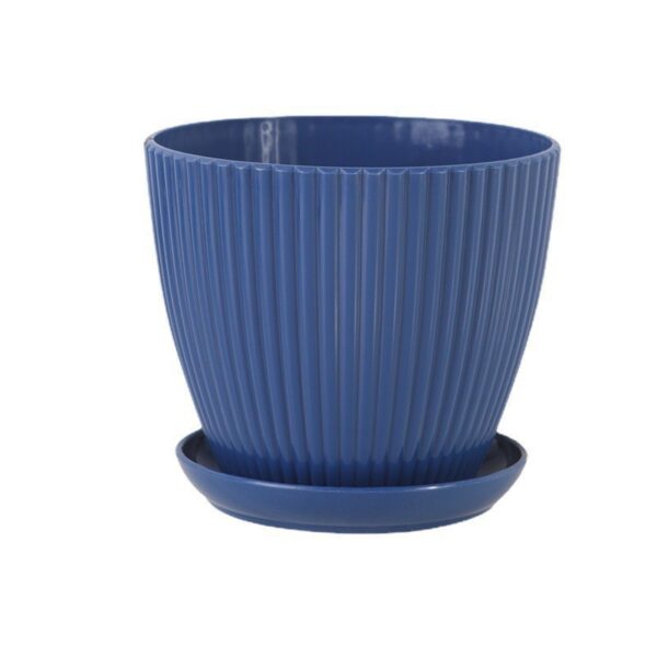 Deep sea blue color plant pot in focus