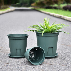 Root control drainage pots, Small, Medium, and Large sizes. The Large pot contains a plant, while the Small and Medium pots are empty, showcasing drainage holes and ventilation.