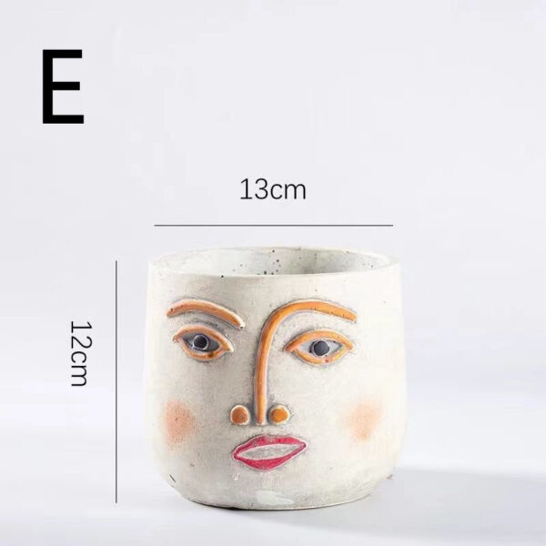 Small Cute Head Flower Pot with a smiling face and dimensions.