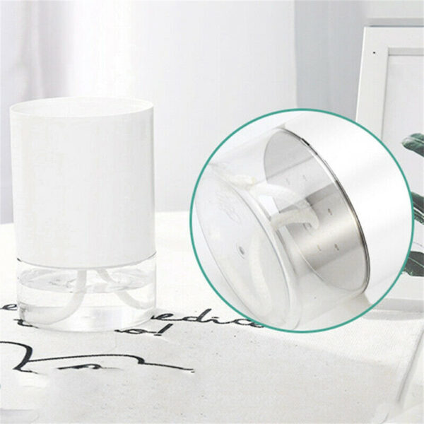 White hydroponic flower pot showing self-watering mechanism on base